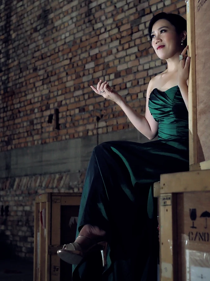 Ang Mei Foong in an emerald gown at RexKL